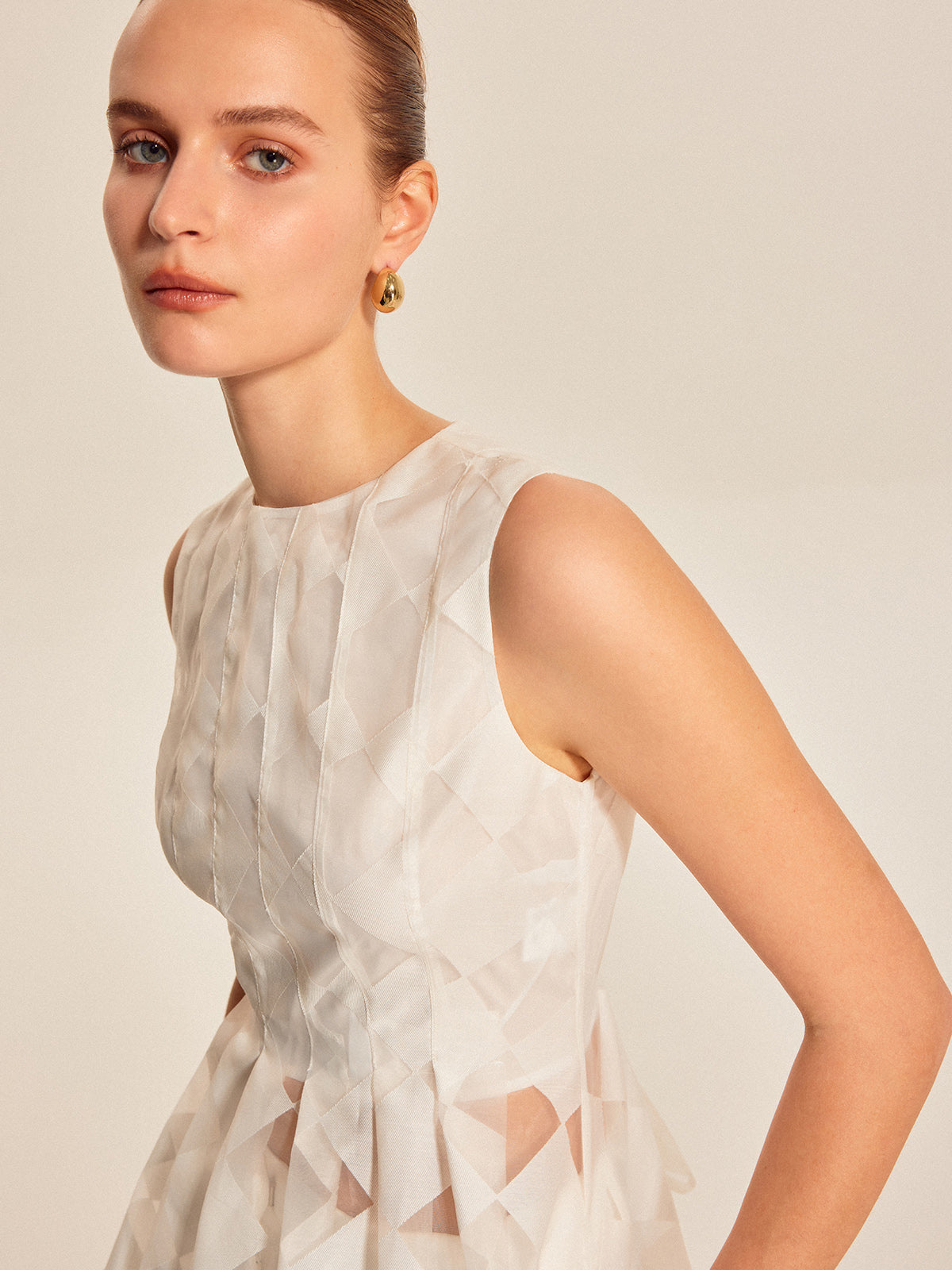Semi-Sheer Geometric Peplum Top