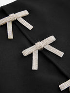Rhinestone Bow Detail Asymmetrical Mini Skirt