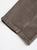 Distressed Denim Curved-Leg Pants